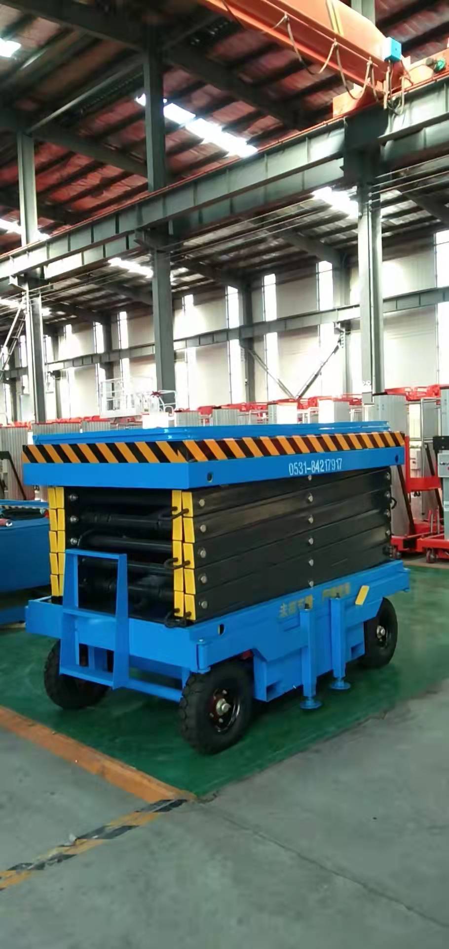 肥城康王酒業(yè)定制10米移動剪叉升降機(圖1) 1f864b47f5fbcf62499c1ce0f5762f9.jpg